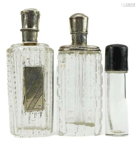 Two antique Dutch silver mounted cut glass scent bottles and...