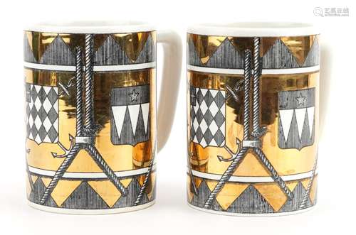 Fornasetti, pair of vintage Italian gold lustre mugs decorat...