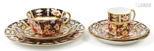 Two Royal Crown Derby Imari pattern trios including coffee c...