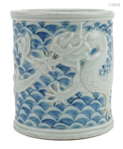 Chinese blue and white porcelain brush pot decorated in reli...