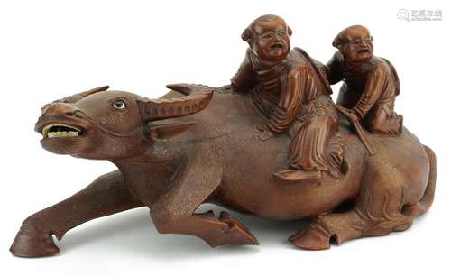 Large Chinese hardwood carving of two boys on water buffalo,...