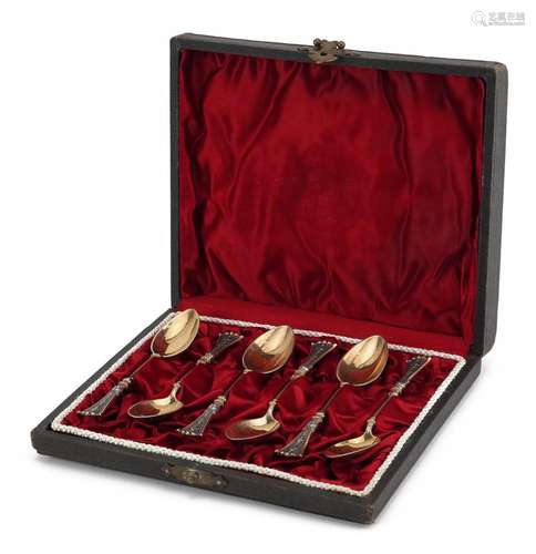 Set of six German 800 grade silver gilt silver teaspoons wit...