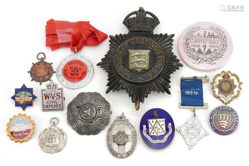 Badges and medallions including Borough of Hastings Police b...