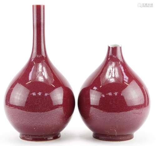 Pair of Chinese porcelain long neck vases having sang de boe...