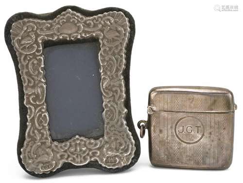 Rectangular silver mounted easel photo frame and a silver ve...