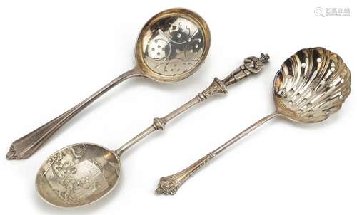 Two Victorian and later silver sifting spoons and a silver P...