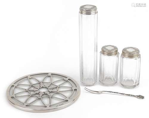 Three Victorian cut glass jars with silver lids, silver over...