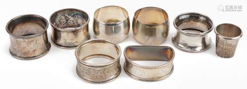 Seven Victorian and later silver napkin rings and a sterling...