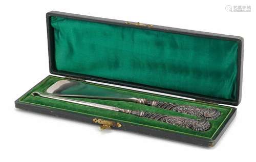 Edwardian silver handled buttonhook and shoehorn housed in a...