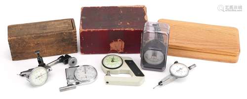 Five vintage watchmakers depth gauges, some with cases, comp...