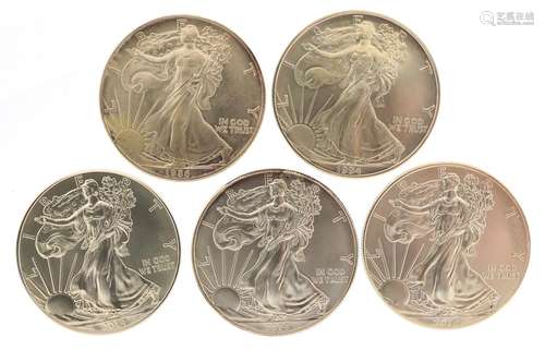 Five United States of America one ounce silver dollars compr...