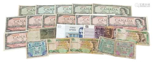 World banknotes including Canadian one dollar and Australian...