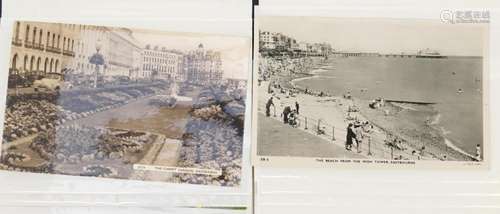 Collection of Eastbourne postcards arranged in two albums in...