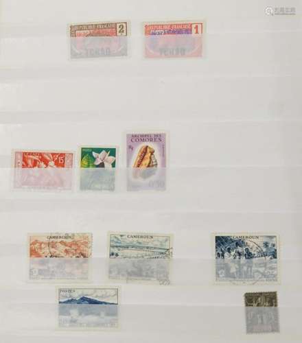 Collection of French Colony stamps arranged in a stock book ...