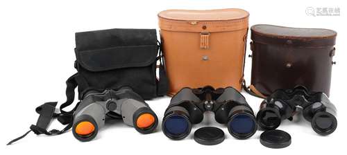 Three pairs of binoculars with cases comprising Ross of Lond...