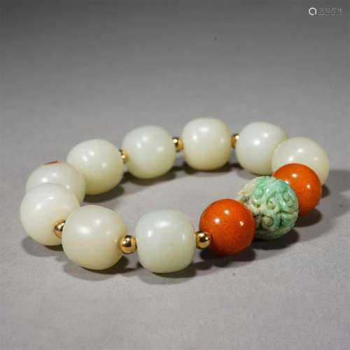 A WHITE JADE AND GEMSTONES BRACELET