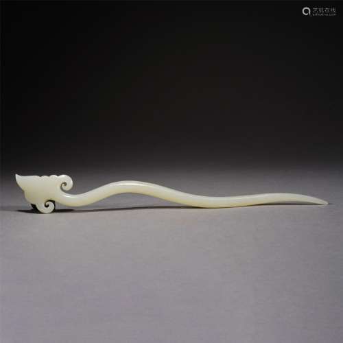 A CARVED JADE HAIRPIN