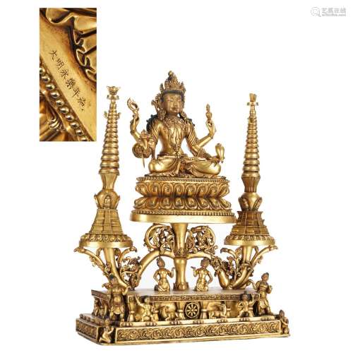 A GILT BRONZE FOUR ARMS FIGURE OF GUANYIN BUDDHA SEATED STAT...
