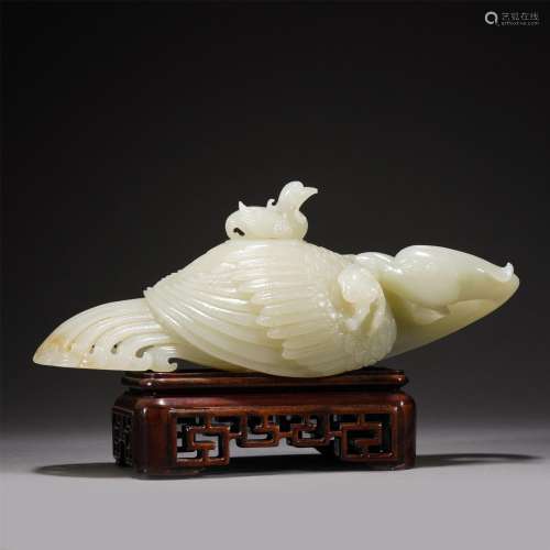 A CARVED JADE PHOENIX FROM WATERPOT