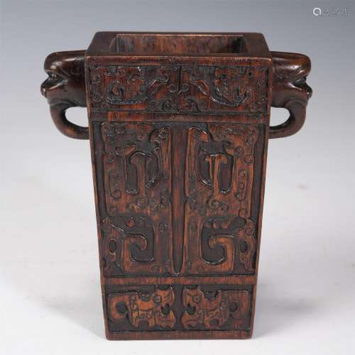 A WOODEN CARVED TAOTIE PATTERN FLOWERS HOLDER,QING
