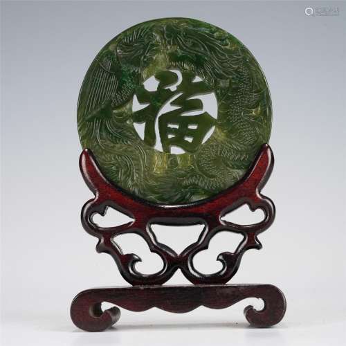 A CARVED SPINACH GREEN JADE TABLE SCREEN