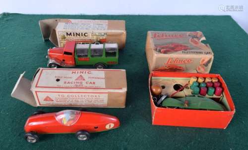 A Shuco Telesteering model car together with a Minic Clockwo...