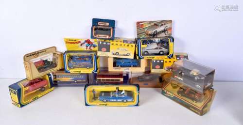 A collection of boxed Corgi and Vanguard model cars and buse...