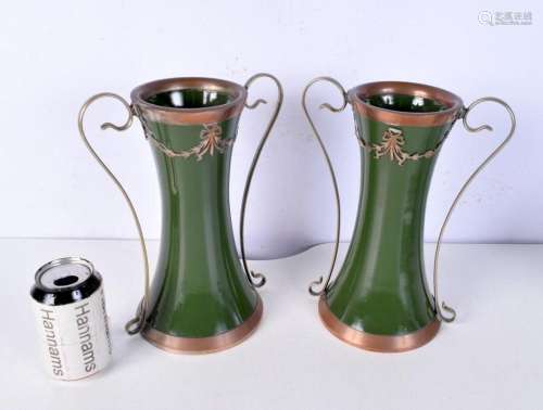 A pair of green porcelain Art Nouveau vases with Silver plat...