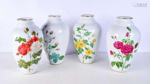 A set of four Limoges porcelain vase, decorated with foliage...