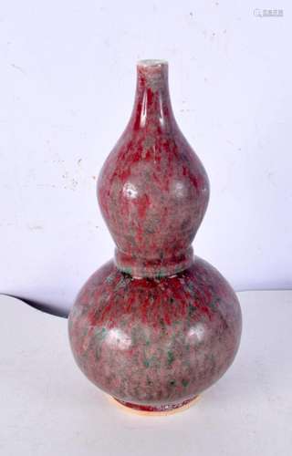 A Chinese flambe glazed mottled double gourd porcelain vase....