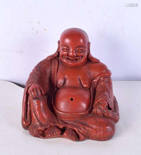 A Chinese lacquered figure of Buddha, formed seated in flora...