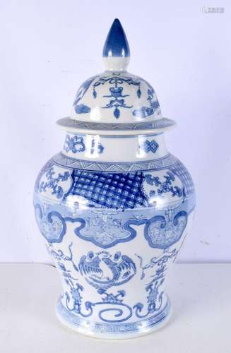 A large Chinese blue and white baluster vase and cover, deco...