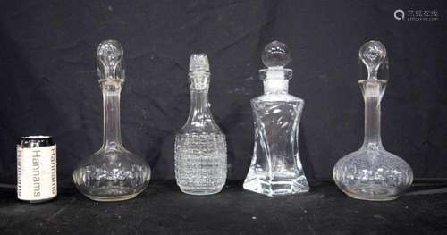 A collection of crystal glass decanters 30 cm (4).