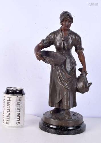 A cold painted bronze figurine of a female field worker 34 c...