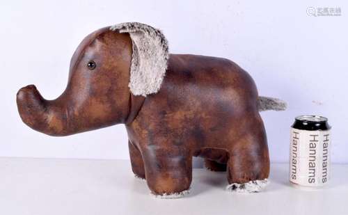 A leather Elephant door stop 28 x 42 cm