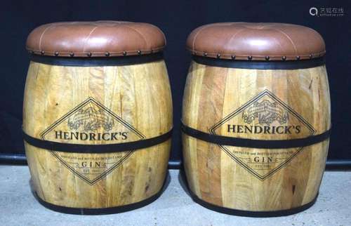 A pair of upholstered wooden gin related barrel seats 54 cm(...