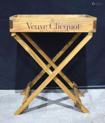 A wooden Champagne related wooden tray on a stand (2).