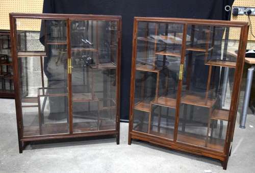 A pair of Chinese hardwood glass display cabinets 112 x 84 x...