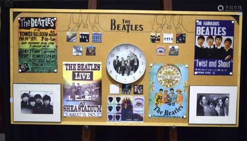 A large collage of Beetles memorabilia 61 x 122 cm.