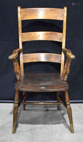 A 19th Century slat back wooden arm chair 109 x 41 x 46 cm.