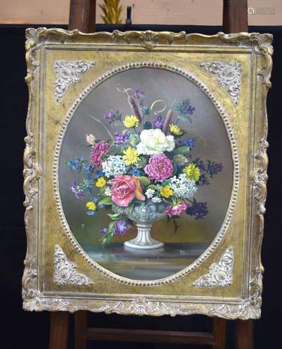 A Framed still life oil on canvas of flowers 52 x 44 cm