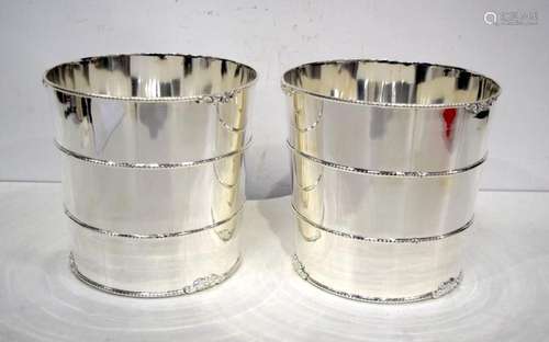 A pair of silver plated barrels shaped wine coolers 20 x 20 ...