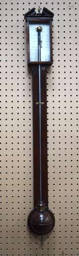 An 18th Century walnut barometer 100cm.