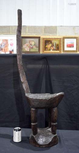 A carved hardwood Tribal gathering high back chair 114 cm.