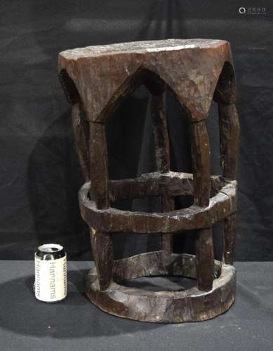 A carved hardwood Tribal stool 56 x 35 cm.