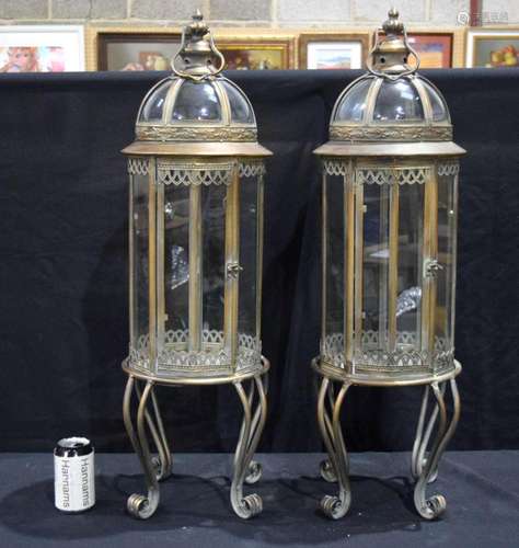 A pair of bronzed metal and glass lanterns 85 cm (2)