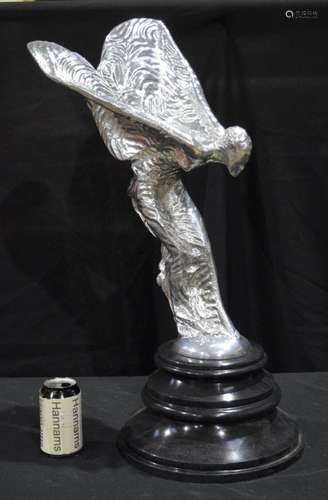 A large spirit of ecstasy chrome figure on a plinth 70 cm.