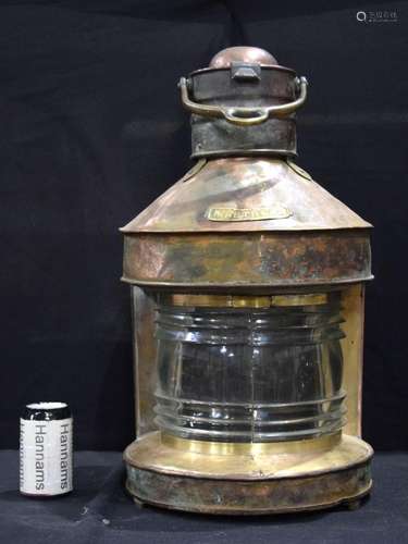 An antique copper and bronze mast head light 56 cm