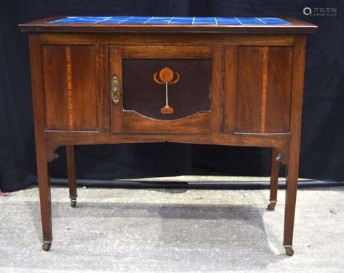 An Edwardian Art Nouveau style cabinet with a tiled top 78 x...