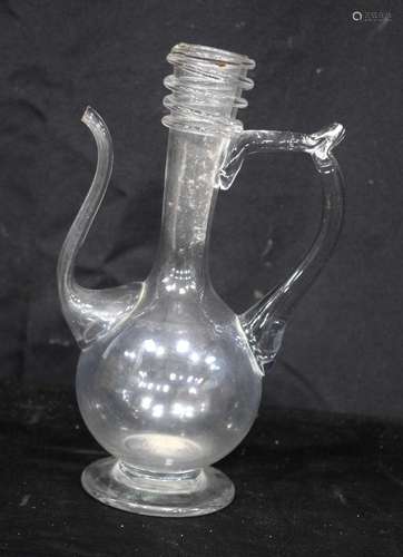 An unusual glass oil pourer 24cm